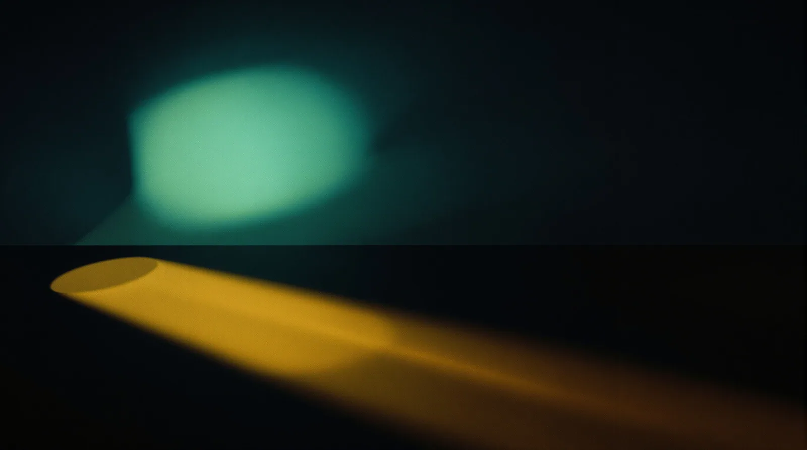 A wide overhead glow beside a focused narrow shaft of light, suggesting the difference between AI Overviews and AI Mode