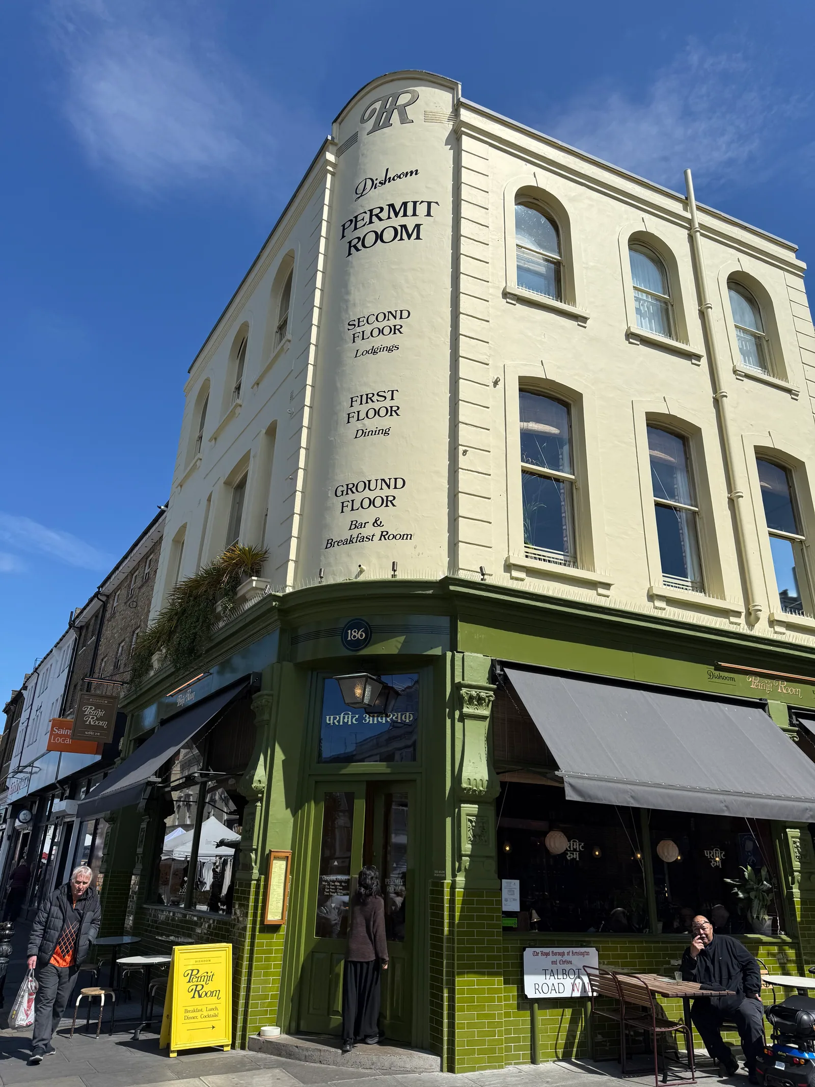 Permit Room Portobello on the corner of Portobello Road in Notting Hill, the green and cream Victorian pub building with rooms upstairs that is Dishoom's breakfast and bar concept